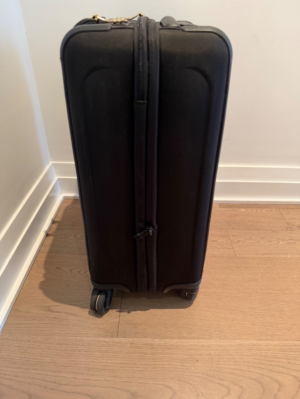 Tumi Black and Gold Cabin (expandable) 4 roller luggage - Picture 2 of 10